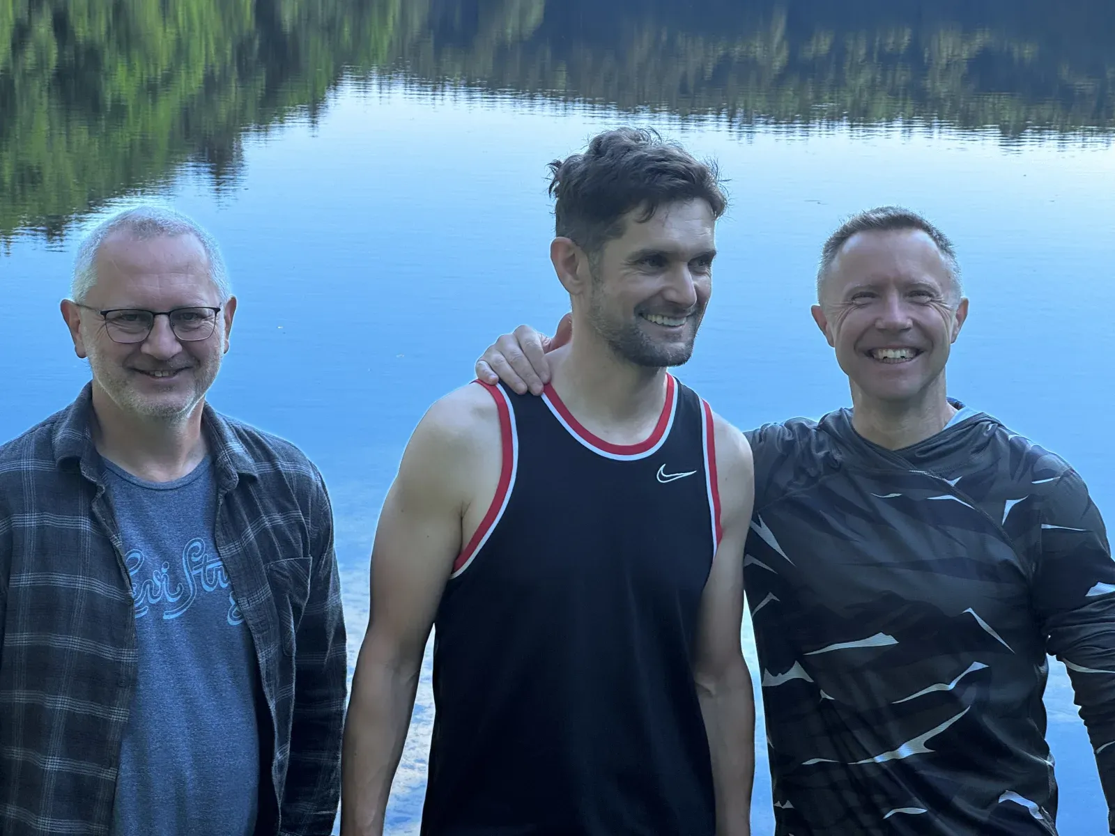 The three coaches of the Kaszuby 2026 open water camp by the lake