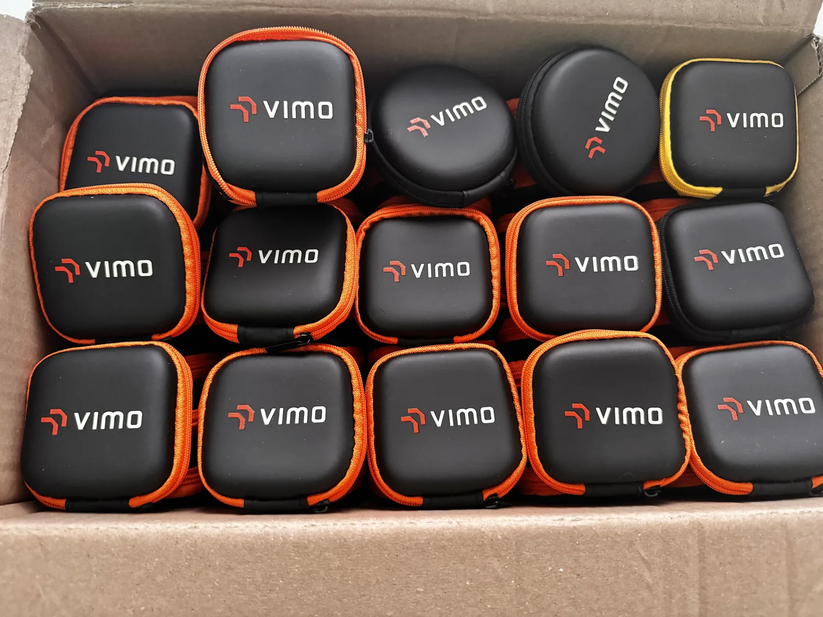 A box of Vimo Swim protective cases fresh from production