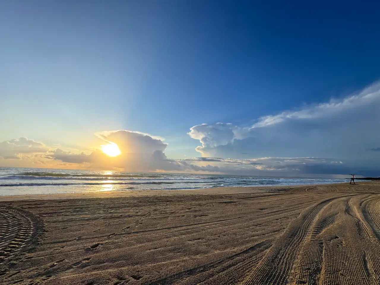 Sunrise over the Mediterranean, an empty beach before the first session