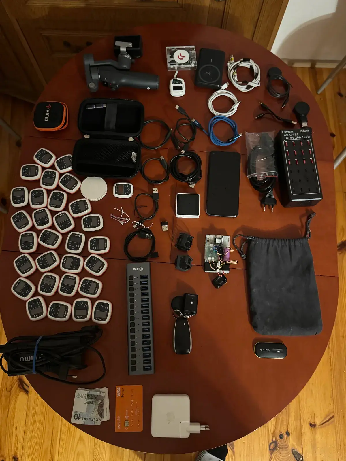 Everything packed for the camp on one table: tempo trainers, cables, a USB hub and a power supply