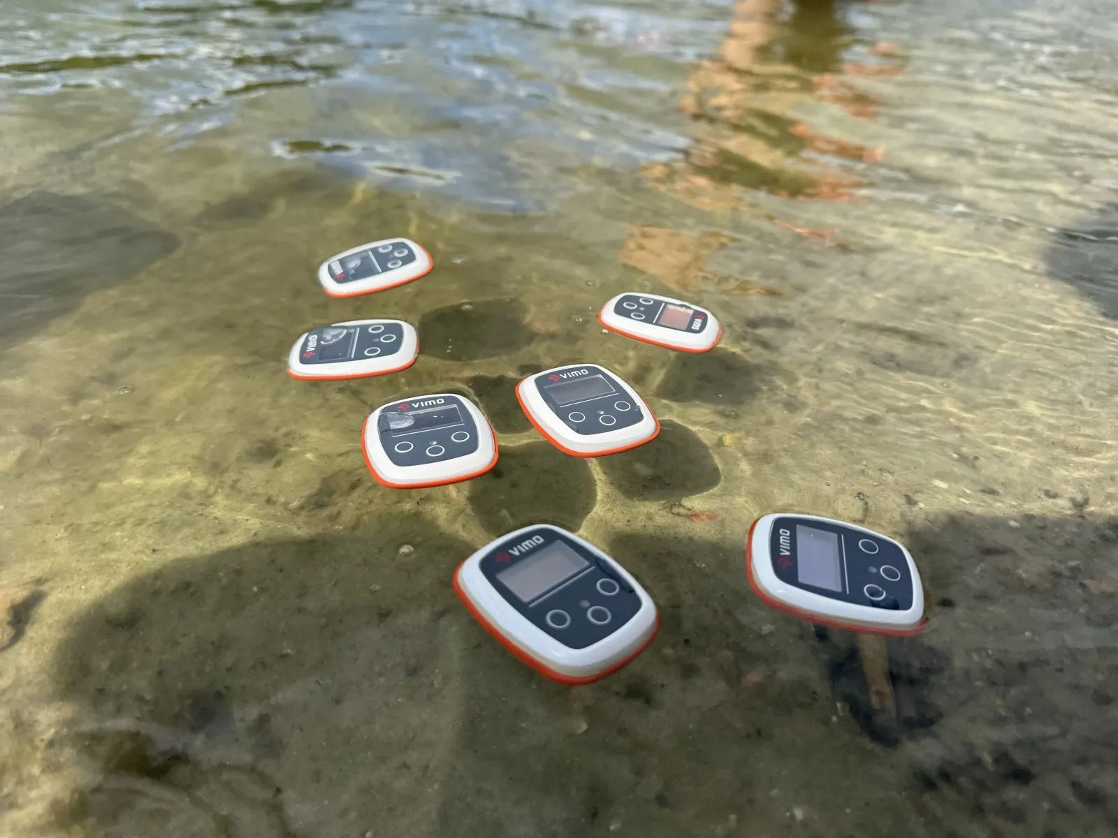 Vimo devices floating in shallow lake water