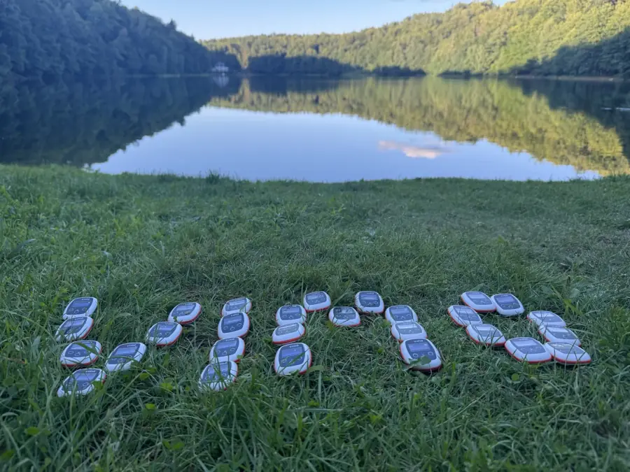 Batch 1 spelling it out by the lake.
